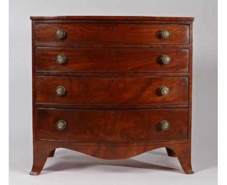 Regency mahogany bowfront chest of drawers, the top with a crossbanded edge above four long graduated drawers and bracket fee