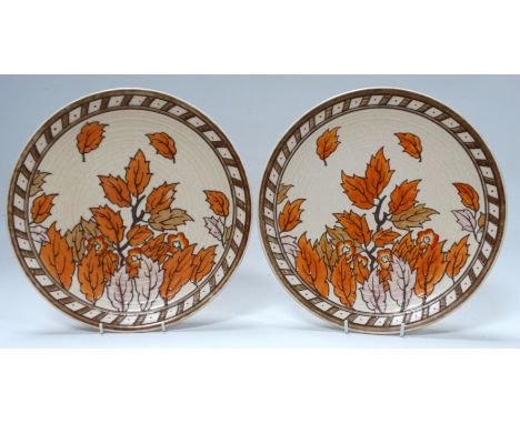 A pair of Crown Ducal chargers by Charlotte Rhead - autumn leaves, 32cm diameter, facsimile factory mark and signature to bas