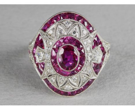 A platinum ruby and diamond set cocktail ring - in an Art Deco style, total weight of rubies 1.15ct, 5.6g