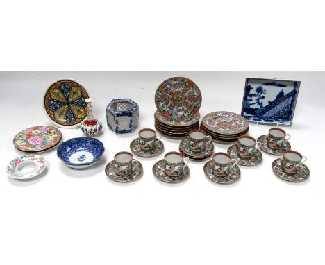 A famille vert Chinese tea service - comprising eight cups, saucers and side plates, together with a small quantity of Chines