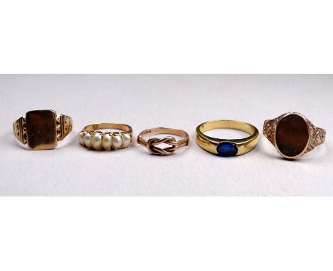 A 9ct gold signet ring - with a vacant cartouche, size R, together with four further 9ct and yellow metal rings, 15.6g