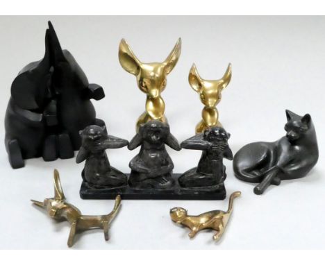A 20th century soapstone monkey figure group - 'Hear No Evil, See No Evil, Speak No Evil', together with a soapstone cat, a c
