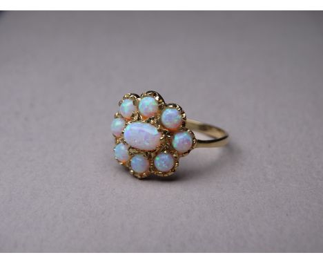 A 9ct gold opal cluster ring - set with cabochon stones, size N, 1.8g