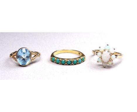 A 9ct opal dress ring - with a floral setting, size N/O, together with an aquamarine set ring and a turquoise set ring, 8.9g 