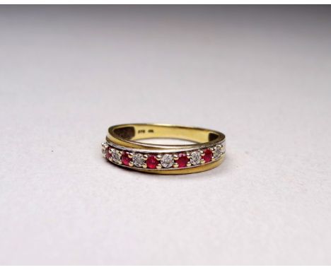 A 9ct gold diamond and spinel set ring - size O, weight 2.3g.