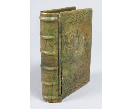A 19th century brass snuff box - modelled as a book, the cover engraved with a cockerel.