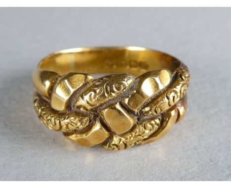 An 18ct gold knot ring - size M, 6.5g
