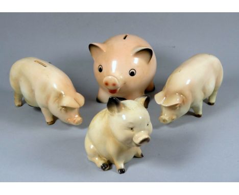 A Goebel pottery piggy bank - pink with a lockable stopper, 18cm long, together with two further Goebel piggy banks and anoth