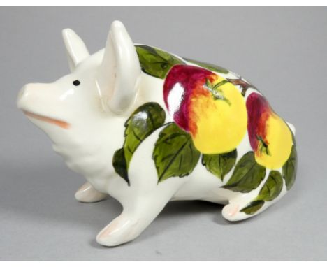 Wemyss Griselda Hill pottery pig - seated, decorated with apples, 18cm wide