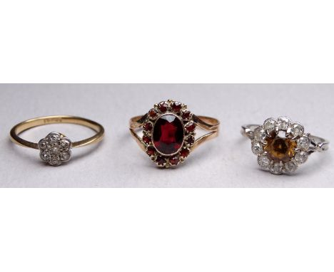 A diamond and yellow topaz dress ring - the central facetted stone within a band of diamonds, size N, together with another g