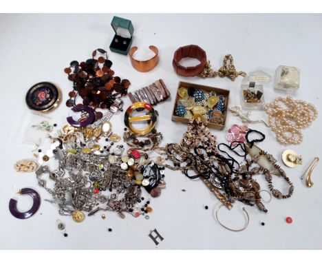 A quantity of costume jewellery - to include a pair of gilt metal opal earstuds and a silver charm bracelet. 