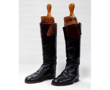 A pair of vintage black and mahogany topped leather riding boots - together with original wooden boot trees, approximately si