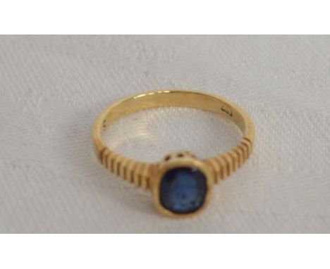 Modern 14ct gold and sapphire solitaire ring the stone of 0.75ct spread approx. stamped 14k, weight 2.3g approx.