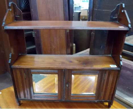 Victorian walnut wall hanging cupboard with an open shelf over a small cupboard with mirrored doors, width 22.5'.