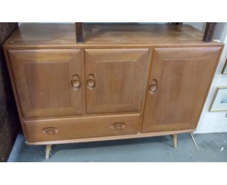 Ercol pale elm sideboard with three cupboard doors and a drawer, width 45'.