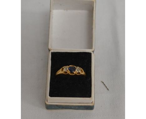 Gold diamond and sapphire three stone ring, the old cut diamonds of 0.10ct spread approx,  weight 3.5g.