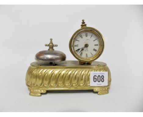 An American bedside alarm clock with small 1.5' enamel dial signed 'Trademark Parker' in drumhead case with push button, the 