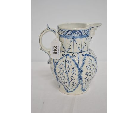 Worcester early 19th Century cabbage moulded blue and white mask beaked jug, height 5.75' (hairline crack)