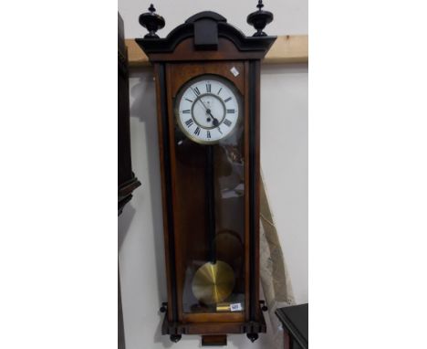 Single train Vienna wall clock, in ebonised walnut case with single subsidiary dial, height 38'.