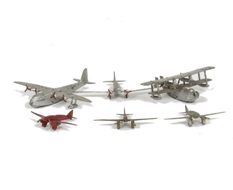 Pre-War Dinky Toys 60g De Havilland Comet, three examples, first silver body, blue wing tips, second red body, gold wing tips