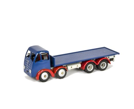 A Shackleton Foden Flatbed clockwork Lorry, in repainted dark blue with red wheel arches and grey chassis and modified as an 
