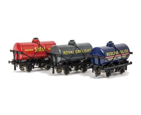 An ACE Trains O Gauge 3-wagon Tanker Set No 5, including red 'Shell', blue 'Redline-Glico' and grey 'Royal Daylight' tank wag