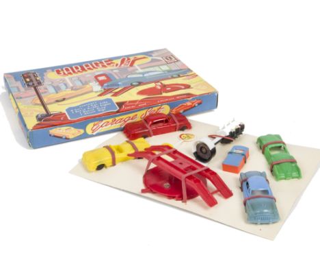 Empire Made (Hong Kong) Plastic Garage Set, comprising four cars, car lift, traffic light, petrol pump and street sign, in or