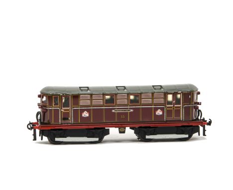 An ACE Trains O Gauge 2/3-rail E17 'Metrovick' Electric Locomotive, in tin-printed Metropolitan Railway maroon as no 15 'Wemb