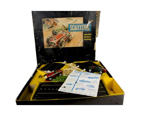 Early Tinplate Cars Tri-ang Scalextric Set and Accessories, comprising a  red No 8 and green No 7 tin Maseratis, rubber track