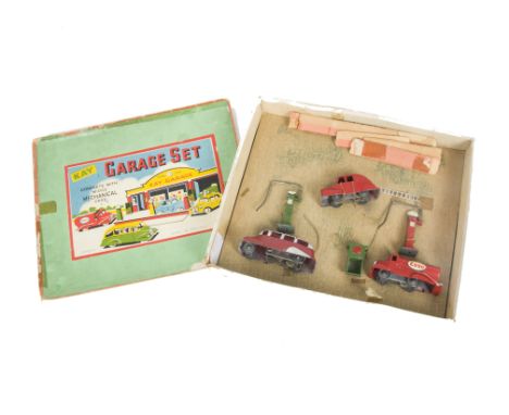 A Kay Garage Set, comprising Midge Esso Tanker, Single deck coach and Fire Engine with ladder, two pumps and oil bin, in orig