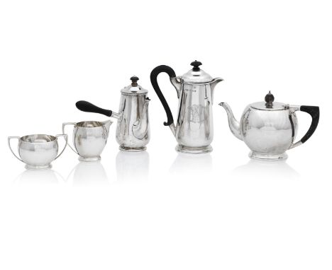 A three piece silver tea serviceby Edward &amp; Sons of Glasgow, London 1935 Of plain spherical form, angular handles, togeth