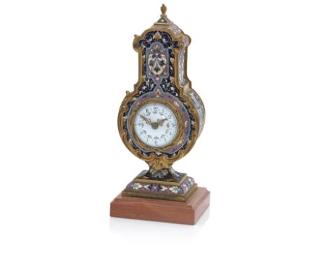 A late 19th/early 20th century champlevé enamel time pieceThe 1 3/4-inch dial with Arabic numerals, the single train movement