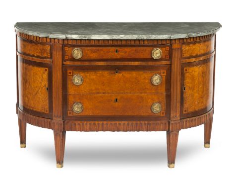 A late 18th Century Dutch burr-elm bowfront marble top commodeThe grey marble with moulded edge, fitted with three drawers fl