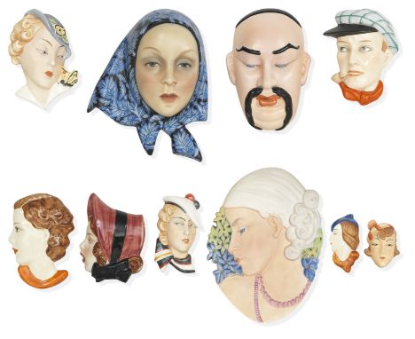 A collection of wall masks including a Lenci wall mask attributed to  Elena König ScaviniCirca 1930Including English and Czec