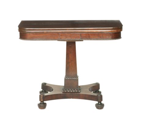 A 19th century mahogany card tableThe rectangular top with beaded frieze, opening on swivel mount to reveal green baize linin