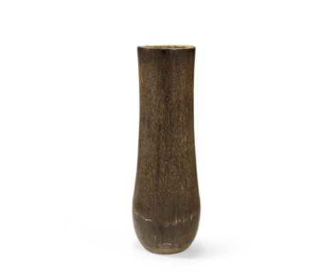 A massive palm wood vase or planterOf cylindrical flared form,  34cm wide, 34.5cm deep, 124cm high (13in wide, 13 1/2in deep,