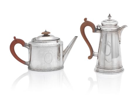 A George III style silver teapot and similar hot water potby C.J.Vander Ltd, London 1969 and 1971 Each of plain form with eng