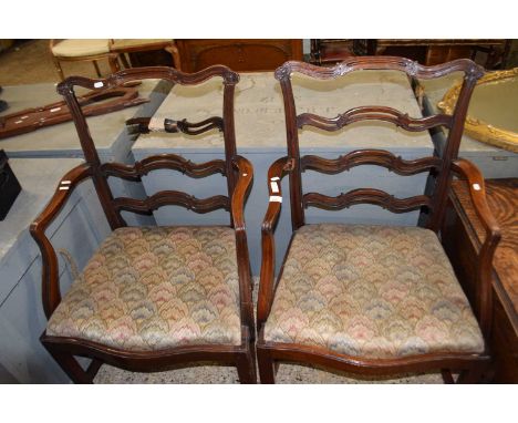 Pair of Hepplewhite style pierced mahogany ladder back carver chairs, one with damaged back