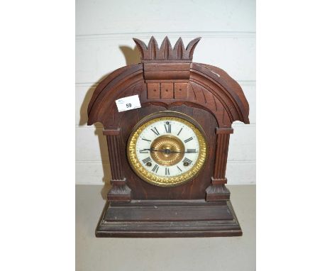 Late 19th Century mantel clock in architectural hardwood case