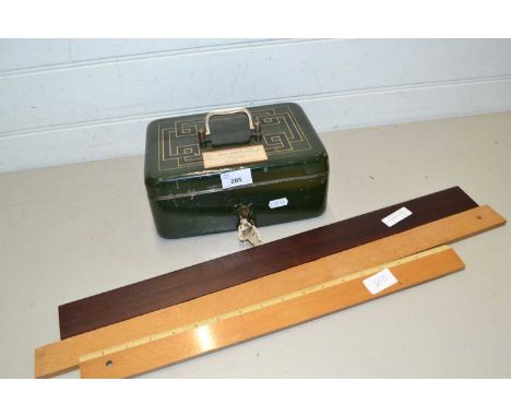 Small metal cash tin together with a selection of vintage rulers