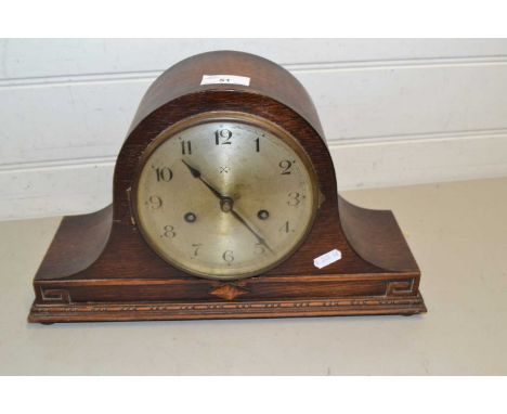 Oak cased dome topped mantel clock
