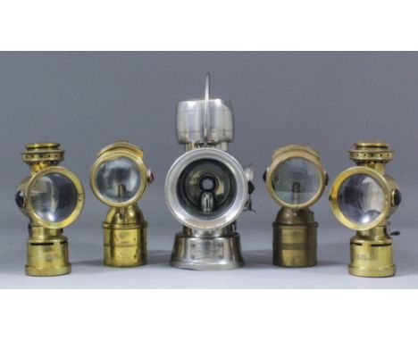 A small collection of early 20th Century cycle lamps, including a Lucas King of the Road, No. 636 lamp, a book by Peter W. Ca