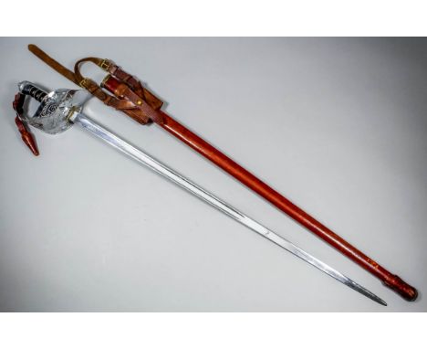 A George V Army Officer's dress sword, the 32ins chromium plated blade and basket hilt with wire bound shagreen covered grip 