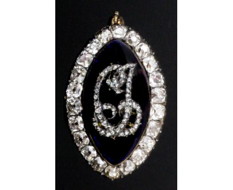 A Victorian gold coloured metal mounted diamond and blue enamel navette pattern mourning brooch, the central blue enamel pane