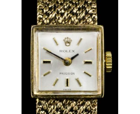 A 1960's lady's 9ct gold cased Rolex wristwatch, the rectangular champagne dial with baton numerals, 15mm square,contained in