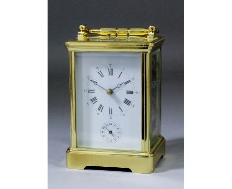 A 20th Century French carriage clock by L'Epee, the white enamel dial with Roman numerals, to the eight day two train movemen