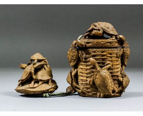 A Japanese carved boxwood inro carved in relief in the form of a basket and cover with six turtles climbing all over, 3.75ins