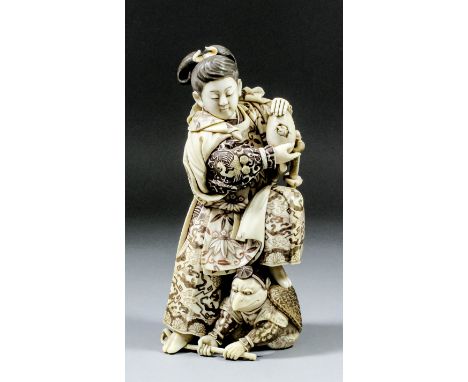 A Private Collection of Japanese Ivory and Boxwood Okimono and Netsuke  A Japanese carved and stained ivory okimono of Yoshit