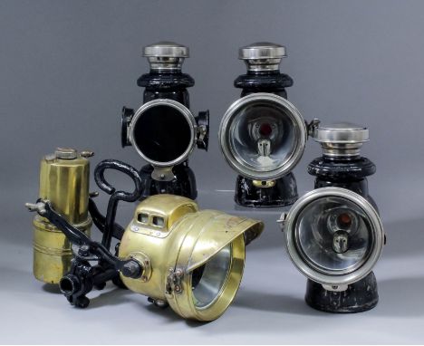 A late 19th/early 20th Century Powell & Hanmer Ltd brass carbide motorcycle lamp with mount, model No. 125, 4.5ins diameter, 