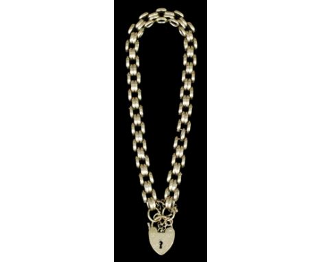 A modern 9ct gold triple gate bracelet with oval links and heart pattern padlock clasp, 185mm overall (gross weight 13.5 gram